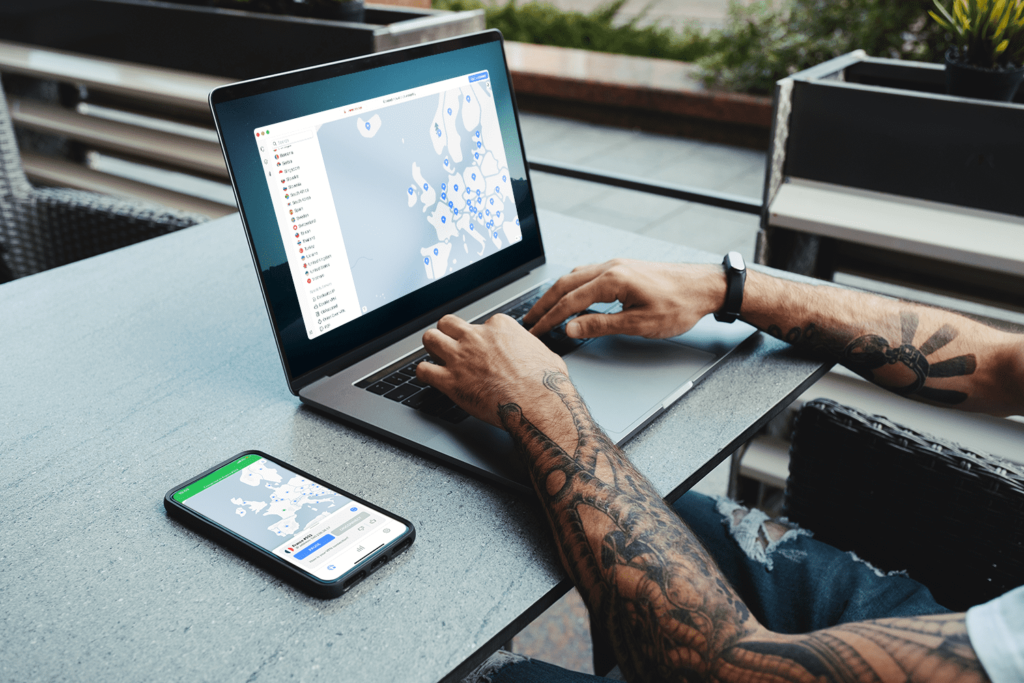 Person using NordVPN on multiple devices for secure online browsing